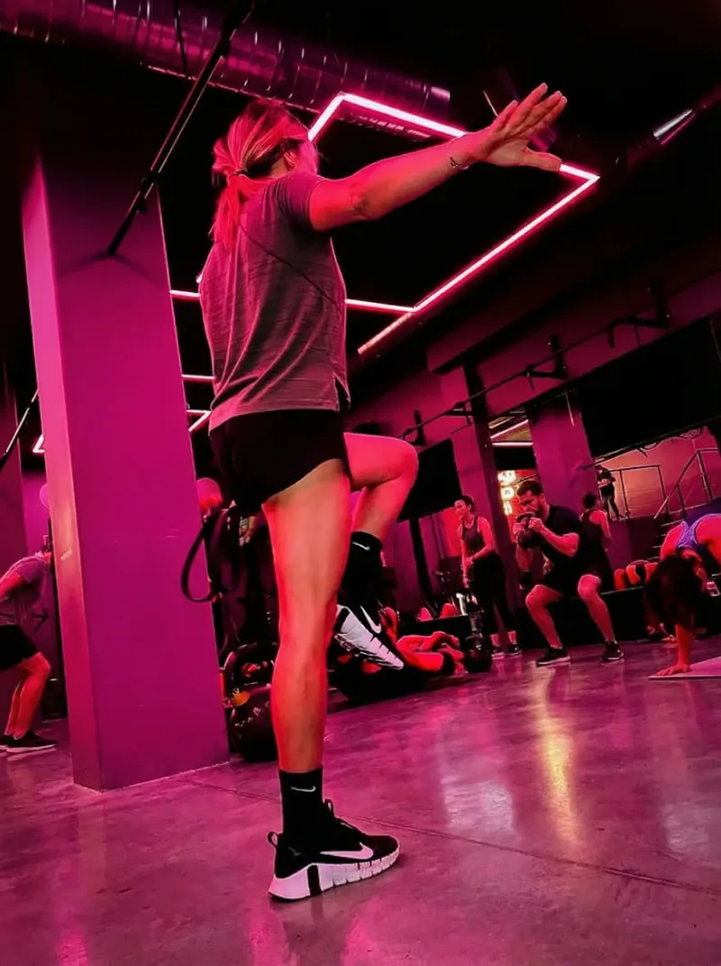 Coach-led training session in a high-energy class environment